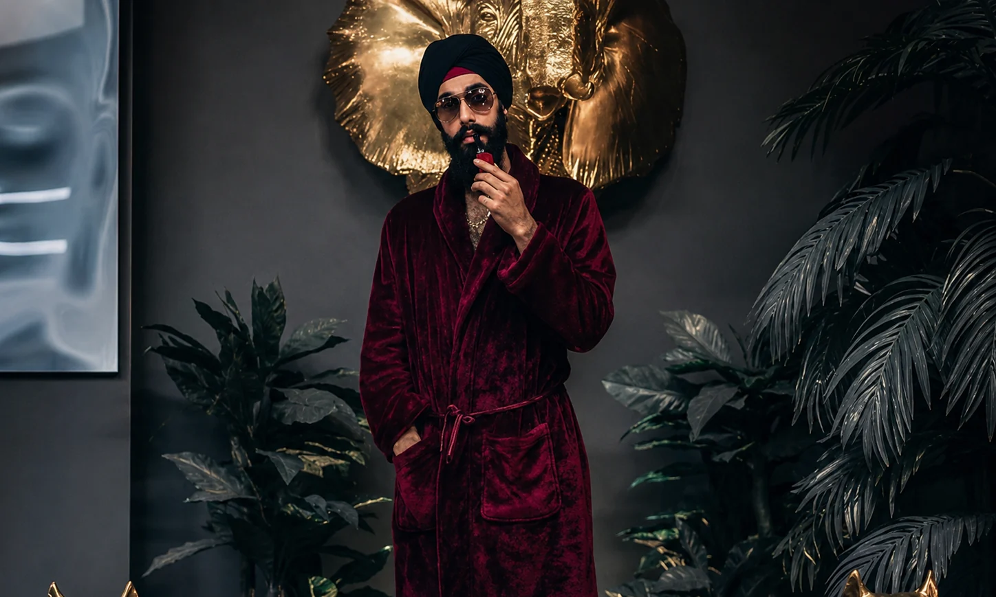A portrait amid art, foliage and sculpture in the GLDC portfolio
