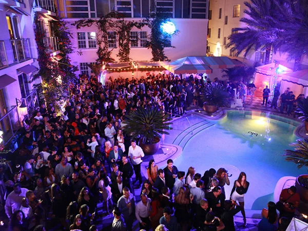 A night-time gathering from the portfolio. The location is unverified; it is not presented as the Williamsburg venue.